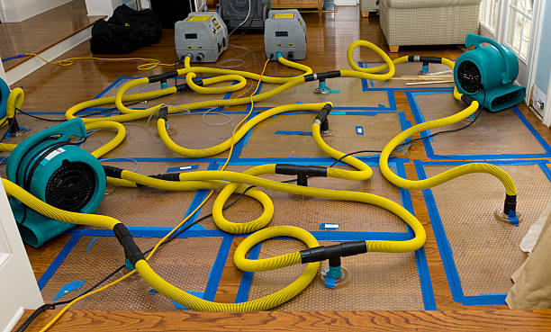 Professional Flood Damage Restoration technician working in Jacksonville, AR